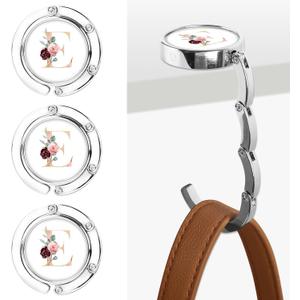 Iqimott 3pcs Personalized Initial Foldable Purse Hook for Table, Flower Letter Folding Handbag Hanger Portable Magnet Table Hook Holder, Collection Desk Purse Hooks for Women Bag (Pink-E)