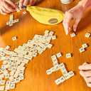 Bananagrams Classic Word Game Fast-Paced Spelling & Anagram, Family & Travel Game , 144 Letter Tiles in Portable Banana Pouch, 18 Players, Educational Wordplay Fun for Ages 7+