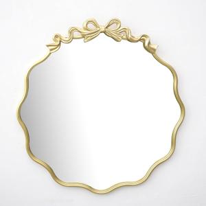 25.75Inch Decorative Gold Bow Metal Wall Mirror - Elegant Wavy Edge Accent Mirror for Bedroom, Bathroom, Entryway & Living Room Home Decor