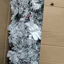 9 ft. Pre-Lit LED Flocked Snow Hinged Pine Artificial Christmas Tree with 550 White Lights