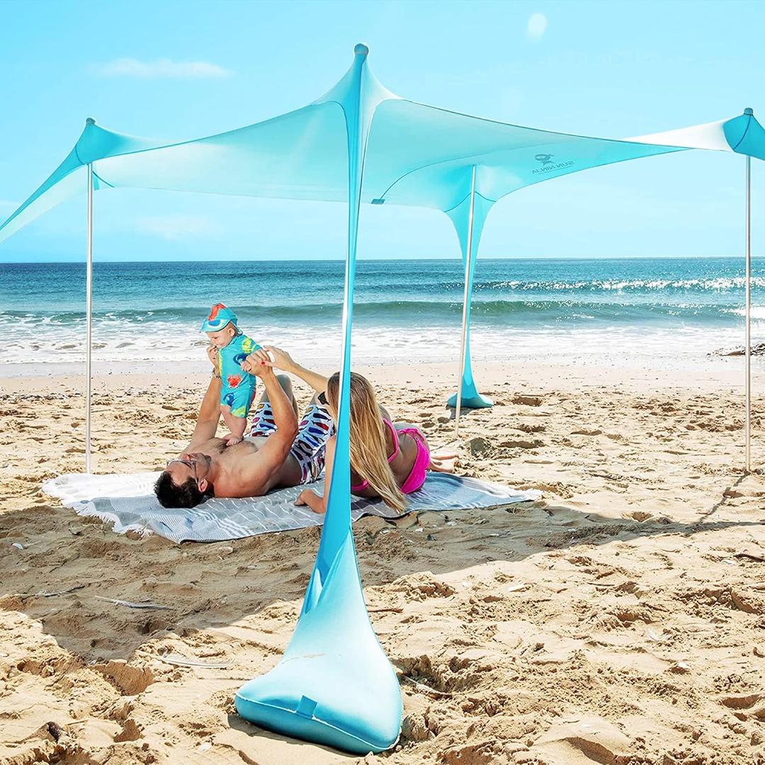 SUN NINJA Beach Tent Sun Shelter UPF50+ - Easy Pop Up Beach Canopy - Outdoor Shade for Camping Trips, Fishing, Backyard Fun Picnics - Sand Shovel, Ground Pegs & Stability Poles (10x10 FT 4 Pole, Turquoise)