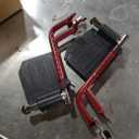 Medline Foldable Transport Wheelchair with Handbrakes and 12-Inch Wheels, Red Frame, Black Upholstery