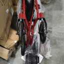 Medline Lightweight Foldable Transport Wheelchair with Handbrakes and 12-Inch Wheels, Red Frame, Black Upholstery