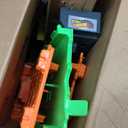 Hot Wheels Toy Monster Trucks, Sharks vs. Dinos Dragon Destruction Playset with 1:64 Scale Great Bite & Rageasaur, Race to Defeat the Cyborg Nemesis