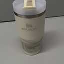 Stanley Quencher H2.0 Tumbler with Straw 20 oz | Flowstate 3-Position Lid | Cup Holder Compatible for Travel | Insulated Stainless Steel Cup | BPA-Free | Cream 2.0