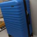 Amazon Basics 30" Hardside Large Checked Luggage, Expandable For Up to 15% More Space, With Scratch-Resistant Surface, Four Multi-directional Wheels, Telescoping Handle, Light Blue