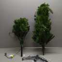 National Tree Company 4.5 ft Pre-Lit Kingswood Fir Slim Artificial Christmas Tree, 150 Clear Lights, 330 Tips, Includes Stand, Green