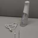 Waterpik Cordless Pulse Rechargeable Portable Water Flosser for Teeth, Gums, Braces Care and Travel with 2 Flossing Tips, Waterproof for Shower, ADA Accepted, WF-20 White, Packaging 