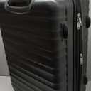 Amazon Basics 26" Hardside Medium Checked Luggage, Expandable For Up to 15% More Space, With Scratch-Resistant Surface, Four Multi-directional Wheels, Black