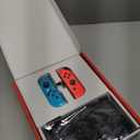 Nintendo Switch with Neon Blue and Neon Red Joy-Con - Handheld Gaming Console (Black)