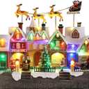 MUMTOP Christmas Village House with Flying Reindeer, Light Up Animated Town Building with Santa Sleigh for Indoor Holiday Xmas Tabletop Decor