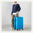 Amazon Basics 26" Hardside Medium Checked Luggage, Expandable For Up to 15% More Space, With Scratch-Resistant Surface, Four Multi-directional Wheels, Light Blue