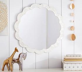 White sun-shaped mirror