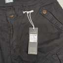 FOURSTEEDS Women's Casual Fitted Multi-Pockets Camouflage Twill Bermuda Cargo Shorts (16, Black)