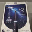 Oral-B Rechargeable Electric Toothbrush, iO5 Limited Deep Clean & Whiten, 5 Cleaning Modes, Visual Pressure Sensor to Protect Gums, Travel Case, 3 Brush Heads, Black (1 Count (Pack of 1))