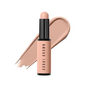 Bobbi Brown Skin Corrector Stick | Creamy & Buildable Color Corrector for Dark Circles & Face | 12-Hour Wear, 0.11 Ounce (06 Light to Medium Bisque (Light-medium pink bisque; corrects blue/purple discoloration under the eyes))