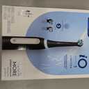 Oral-B Rechargeable Electric Toothbrush, iO3 Limited Deep Clean, 3 Cleaning Modes, Visual Pressure Sensor to Protect Gums, 2 Brush Heads, Travel Case, Black