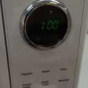 Nostalgia Retro 1000W Microwave Oven 1.1 Cu Ft Capacity  Child Safety Lock, 8 Auto-Cook Settings  Countertop Kitchen Appliance  White