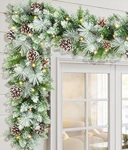 LAVEVE Pre-lit Christmas Garland 9 FT with 100 Warm Lights, Battery Operated Xmas Garland with Cedar Cones and Red Berries, Christmas Decoration for Mantle Fireplace Stair Railing Porch