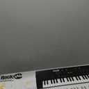 RockJam 49 Key Keyboard Piano with Power Supply, Sheet Music Stand, Piano Note Stickers & Simply Piano Lessons, Black