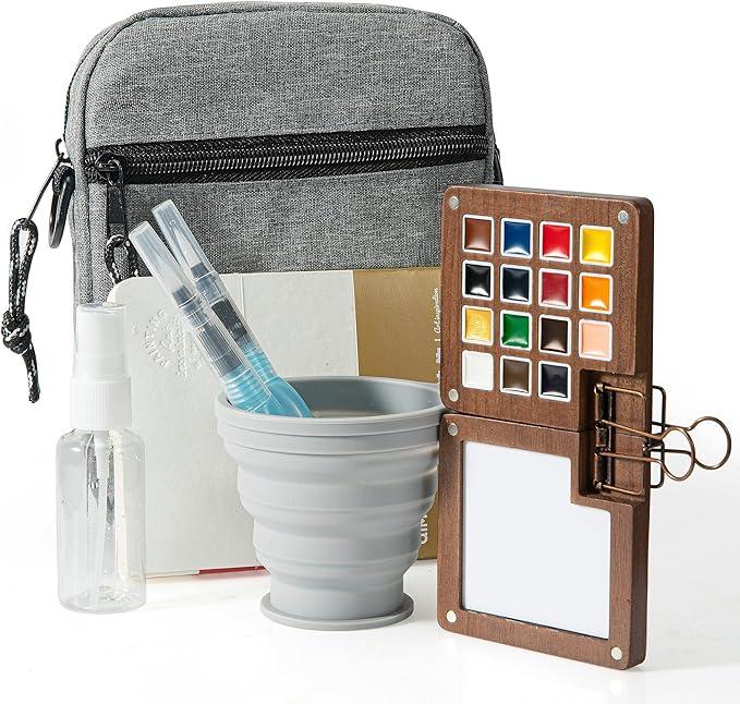 Mini Paint Palette Travel Kit  15Colors Pocket Artist Water Color Travel Set with Crossbody Bag, Watercolor Journal, Metal Clip, Paint Water Cup, Water Brush, Wooden Paint Box for Painters Artists