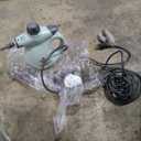 BISSELL Steam Shot Deluxe handheld pressurized steamer for maintenance cleaning with 10 cleaning tools