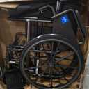 Medline Comfortable Folding Wheelchair with Swing-Back Desk-Length Arms and Swing-Away Footrests, 20”W x 16”D Seat