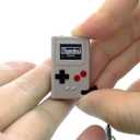 TinyCircuits Thumby Programmable Game Console Keychain Retro Gaming Fun Mini-Console, STEM Learning, USB Rechargeable, 5 Preloaded Games (Gray)