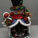 MOMENTS IN TIME Snowman with Animated Christmas Village Scene LED Lighted Musical Holiday Decoration with Moving Train Adapter Included 18.7 Tall Festive Home Decoration