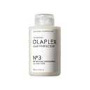 Olaplex No. 3 Hair Perfector Repairing Hair Treatment. Davines MoMo Conditioner. Quenching + Coconut Curls Curl-Defining Shampoo