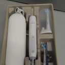 Oral-B Rechargeable Electric Toothbrush, iO3 Limited Deep Clean, 3 Cleaning Modes, Visual Pressure Sensor to Protect Gums, 2 Brush Heads, Travel Case, White (1 Count (Pack of 1))