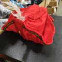 Red Costume Hat With Gold Trim And White Feathe