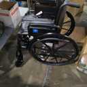 Medline Lightweight Wheelchair for Adults With Swing-Back Desk-Length Arms, Swing Away Leg Rests, 300 lb Capacity, 18" Seat