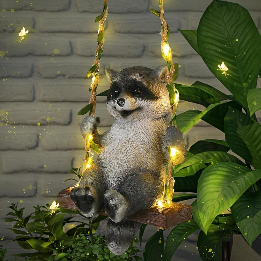 Thyle Solar Light Outdoor Raccoon Statues 19" H Hanging Raccoon on Swing with LED Light Resin Waterproof Hanging Animal Figurine with Hook for Yard Garden Wall Decoration Gift
