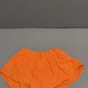 MCEDAR Women's Running Shorts Low Waisted 2.5"Lightweight Active Workout Quick Dry Gym Athletic Sports Shorts Zip Pocket (Bright Orange) S