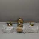 Kichler, Brinley 24" 3 Light Vanity Light with Clear Glass in Champagne Bronze for Bathroom and Powder Room, (24" W x 10.25" H), 45689CPZ