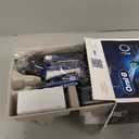 OralB Rechargeable Electric Toothbrush, iO5 Limited Deep Clean & Whiten, 5 Cleaning Modes, Visual Pressure Sensor to Protect Gums, Travel Case, 3 Brush Heads, Black