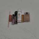 e.l.f. Monochromatic Multi Stick, Loreal Lip Oil, e.l.f concealer, Elta MD Face Sunscreen, e.l.f. Concealer, Physicians Formula Loose Powder
