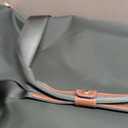 Bric’s X-Bag 21” Rolling Duffel – Water-Resistant Recycled Nylon Carry-On with Silent Wheels, Leather Details, Exterior Zipped Pocket, Garment Straps & Detachable Shoulder Strap – Olive