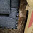 Accent Chair, Chesterfield Inspired Club Chair in Charcoal Fabric, Deep Button Tufting, Scrolled Tuxedo Arms, Birch Wood Legs, Ideal for Living Room Decor. Animal fur. There is a Dent.