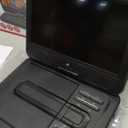 GPX PDB1077B 10in Bt Portable DVD Player Wl Perp Bt Headphones