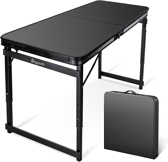 Folding Camping Table 4Ft X 2Ft, Aluminum Portable Adjustable Fold Table
3-Position Adjustable Height, Lightweight Carry Handle, Medium Collapsible Camp Table for Picnic, Beach and Outdoor Cooking