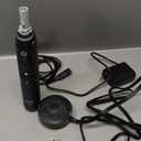 Oral-B iO Series 7G Electric Toothbrush with 1 Replacement Brush Head, Black Onyx