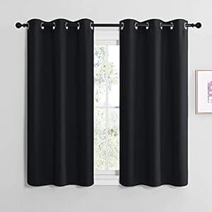 NICETOWN Blackout Draperies Window Curtain Panels, Autumn/ Winter Thermal Insulated Solid Grommet Blackout Curtains/ Drapes for Cafe (Set of 2, 42 inches by 50 inches, Black)