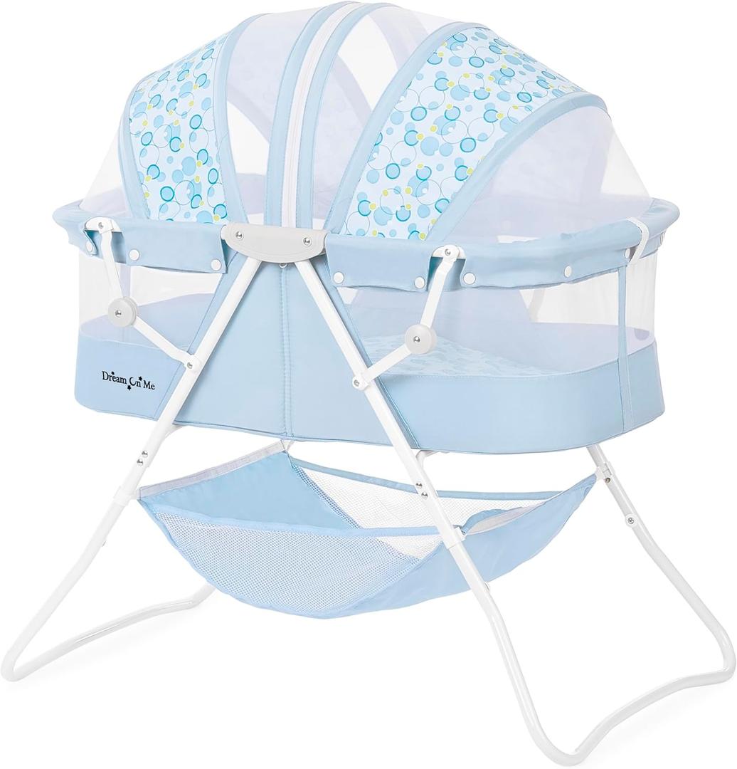 Dream On Me Karley Bassinet in Light Blue, Lightweight Portable Baby Bassinet, Quick Fold and Easy to Carry, Adjustable Double Canopy, Indoor and Outdoor Bassinet with Large Storage Basket.