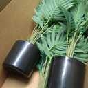Jexine 4 Pack Artificial Areca Palm Plant Fake Palm Tree, Faux Plant for Home Decor Indoor Outdoor Faux Areca Palm Tree in Pot for Home Office Housewarming Gift Modern Decoration (2 Feet)