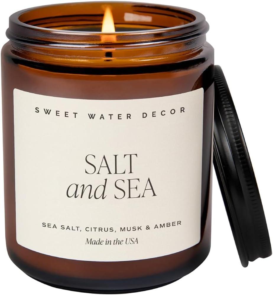 Sweet Water Decor Salt and Sea Soy Candle - Sea Salt, Citrus, Musk, and Amber Scented Beach Candle for Home - 9oz Amber Jar + Black Lid, 40+ Hour Burn Time, Made in The USA