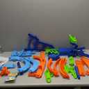 Hot Wheels Track Set with 4 Loops, 3-Way Crash Zone & Motorized Booster, Folds for Storage, with 1:64 Scale Toy Car