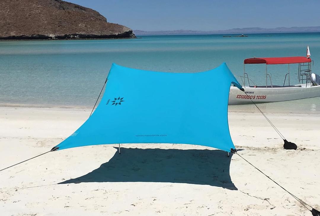 Neso Portable Beach Tent Sun Shelter with Sand Anchor - Lightweight Beach Shade Canopy - Easy Setup for Family Outings - Patented Reinforced Corners - UPF 50+ Sun Protection - 7 x 7ft - Teal