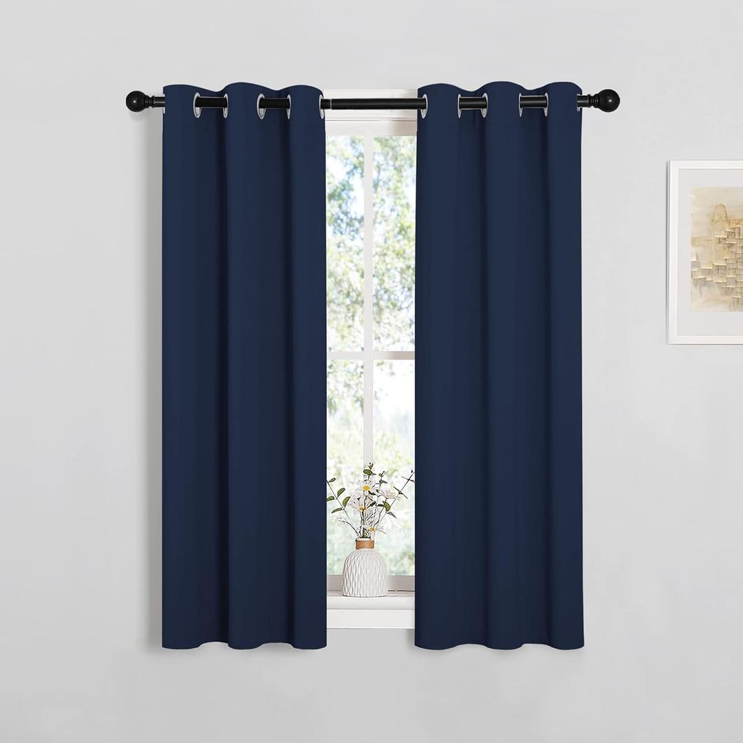NICETOWN Blackout Draperies Curtains, All Season Thermal Insulated Solid Grommet Top Blackout Curtains/Drapes for Kid's Room (Navy, 1 Pair, 29 x 45 Inch)